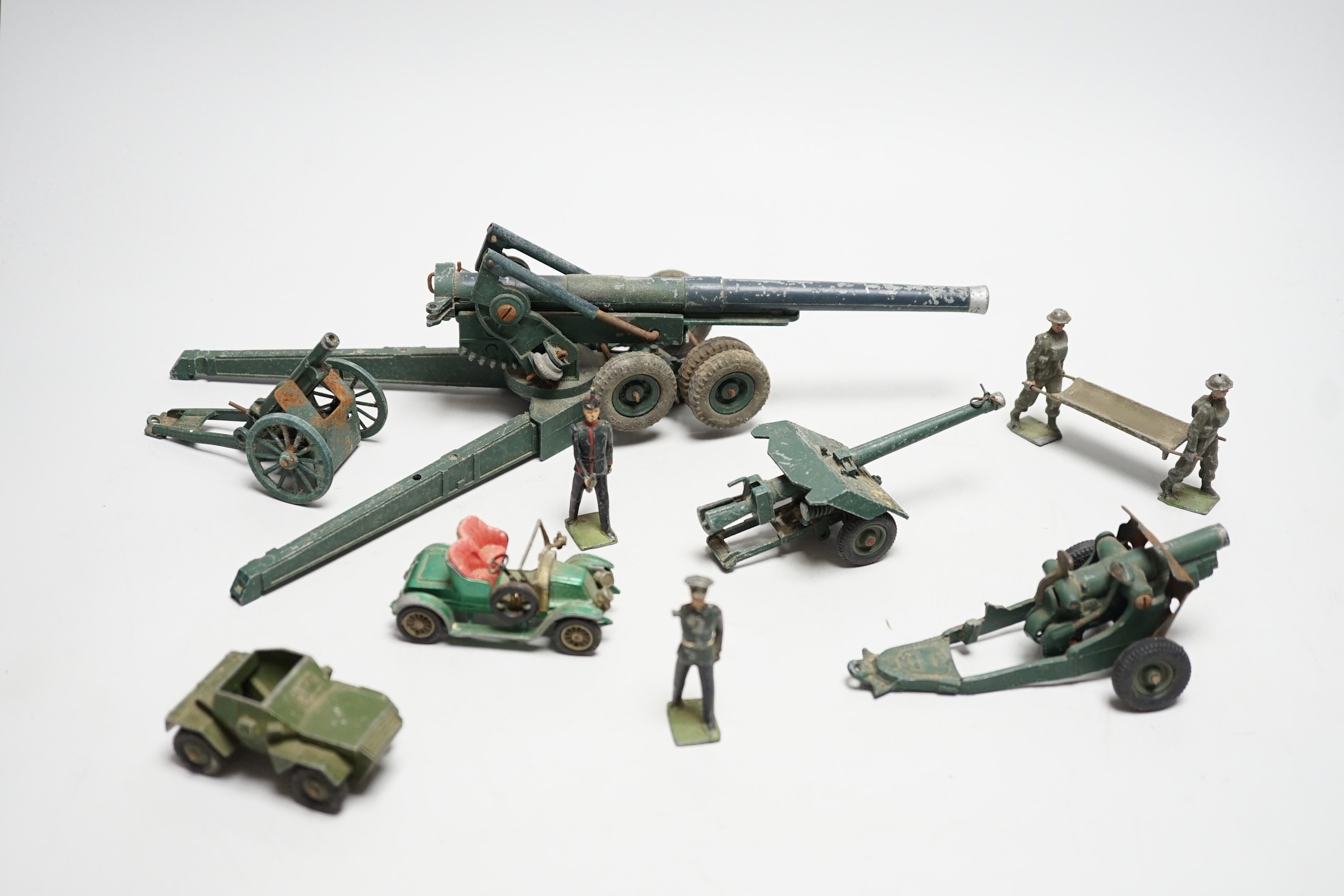 A quantity of military toy lead soldiers, artillery etc.
